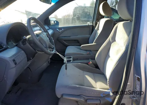 2010 Honda Odyssey Lx z USA, uszkodzony, nr VIN 5FNRL3H27AB026815